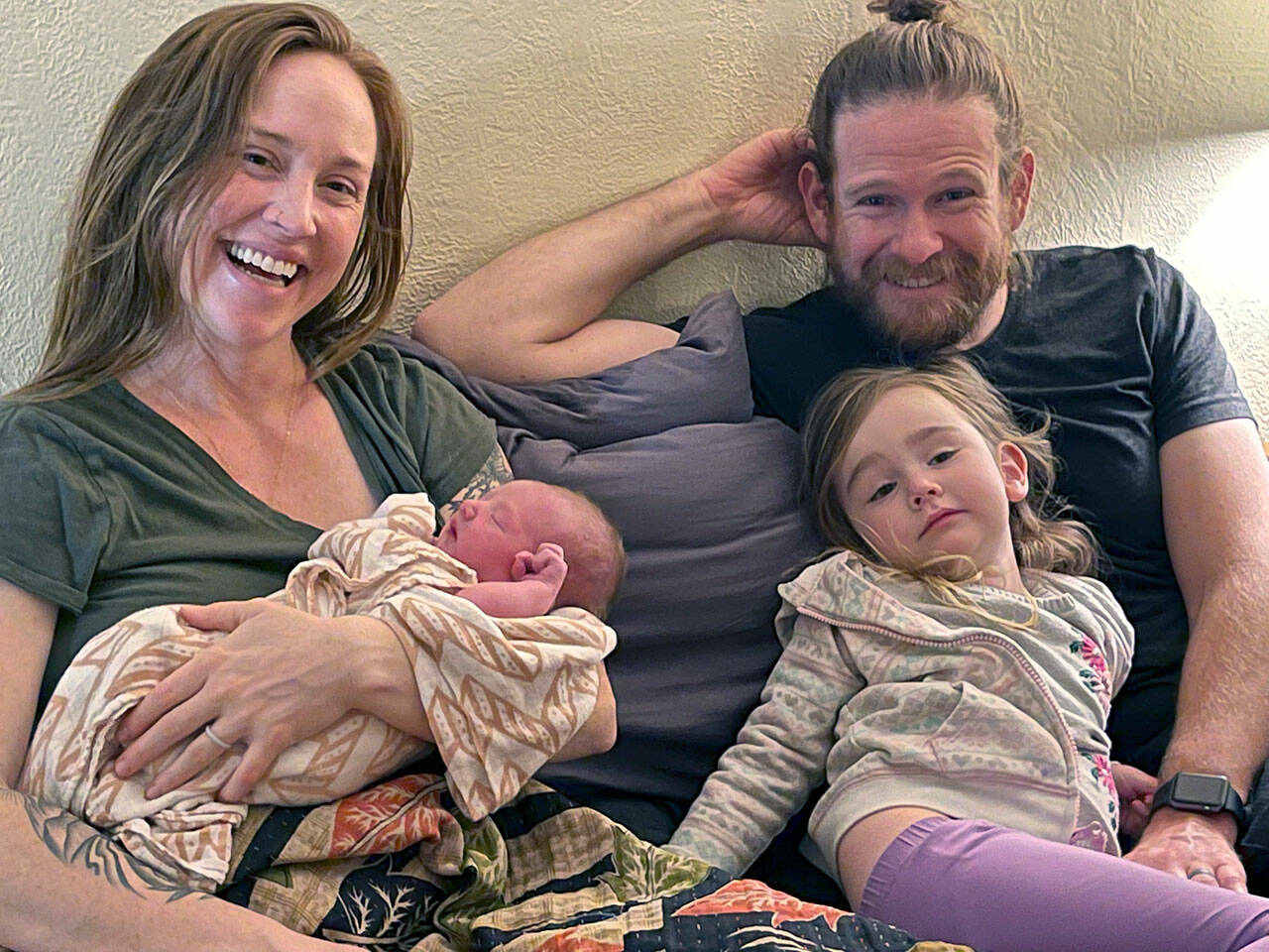 Indie Bo Bruner was born at home to Laura and Rusty Bruner of Port Angeles at 2:44 a.m. New Year’s Day. She is seen here soon after the birth with her older sister, Evie Wilder Bruner, by her side. (Mallorie Kirsch, LM CPM)