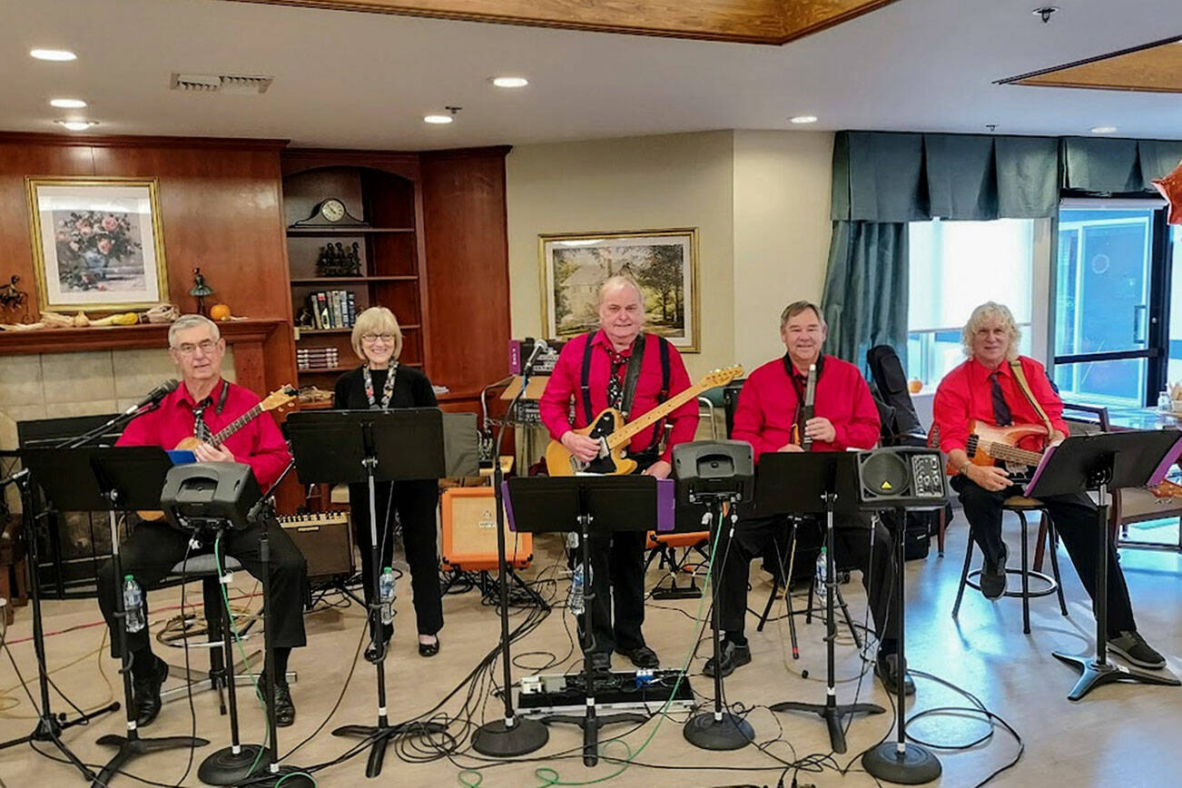 Buttercup Lane — which includes, from left, members Mike and Diane Johnson, Rodger Bigelow, Dave Keyte and Joe D’entrone — play at Olympic Theatre Arts Center tonight.