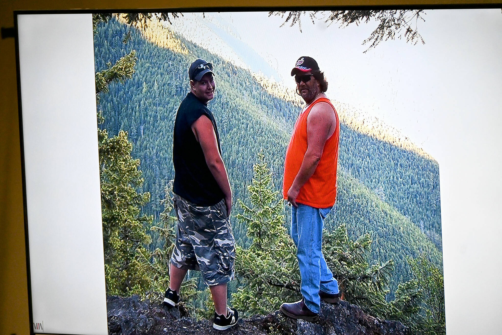 A photo of murder victims Jordan Iverson, left, and his father, Darrell Iverson, was shown to the jury last week during Deputy Prosecuting Attorney Michele Devlin’s closing argument.