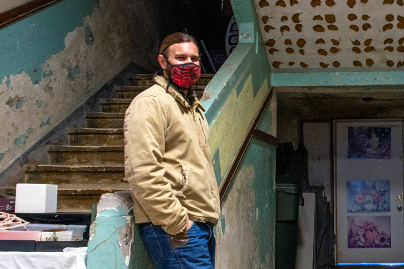David Brownell, executive director of the North Olympic History Center in Port Angeles, pauses near the back entrance to the old Lincoln School. (Emily Matthiessen/Olympic Peninsula News Group)