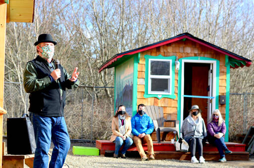 Community Build Project builder Randy Welle marvels at the completion of Pat's Place, the tiny home village in Port Townsend, on Saturday afternoon. (Diane Urbani de la Paz/Peninsula Daily News)