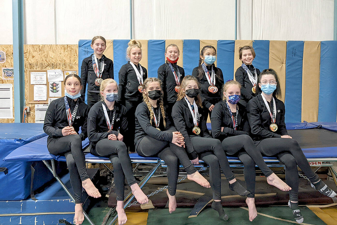 Klahhane Gymnastics performed well at The Freedom Invitational last weekend in Silverdale. Cascade Elite West hosts the annual event honoring those serving in the military or as first responders. A portion of event proceeds is donated to the USO. Team members are, back row, from left: 
Gracelyn Goss, Raynee Ciarlo, Elyse Brown, Kira Hartman, Harper Hilliker and front: Saffron Tschida, Mariah Traband, Neveah Thurman-Dupuis, Taylor Bugge, Lucy Spelker (did not compete), Jessamyn Schindler.