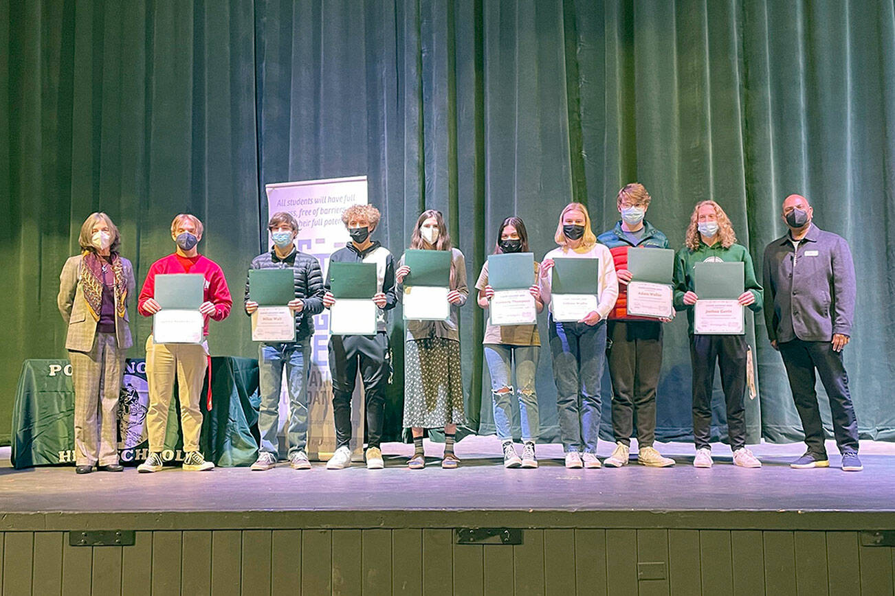 Pictured, from left to right, Annette Wendel, board member; Academic Achievement awardees James Saskowsky, Miles Wait, Damon Gunderson, Emi Halberg, Kimberly Thompson, Gillian Wolfe, Adam Weller and Joshua Gavin; and Ray Chirayath, board president.