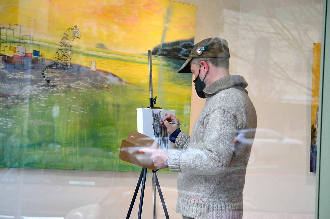 Todd Horton, who did a live painting event at Northwind Art’s Grover Gallery in January, will return for more live painting this Saturday and Sunday afternoon. Horton’s show, “The Mystic West,” is on display at the downtown Port Townsend gallery through March 14. (Diane Urbani de la Paz/Peninsula Daily News)