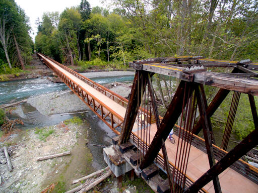 The Railroad Bridge outside the Dungeness River Nature Center is pictured looking west from the parking lot and buildings. (John Gussman)
