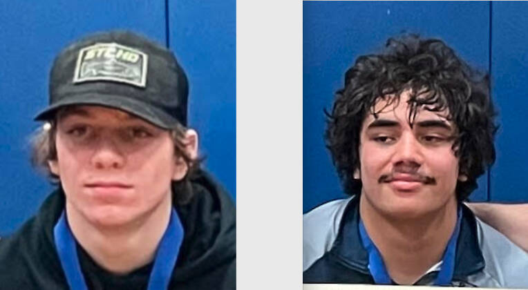 Conner Demorest, left, and Sloan Tumaua, Forks wrestling