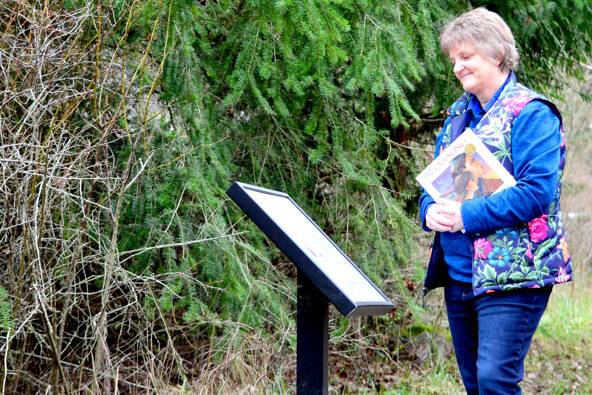 Jan Jacobson of the Port Townsend Library helped choose “Seya’s Song,” the current StoryWalk at Kah Tai Lagoon in Port Townsend. “Seya’s Song” is a book that contains S’Klallam words in its story about the people and wild creatures of the North Olympic Peninsula. (Diane Urbani de la Paz/Peninsula Daily News)