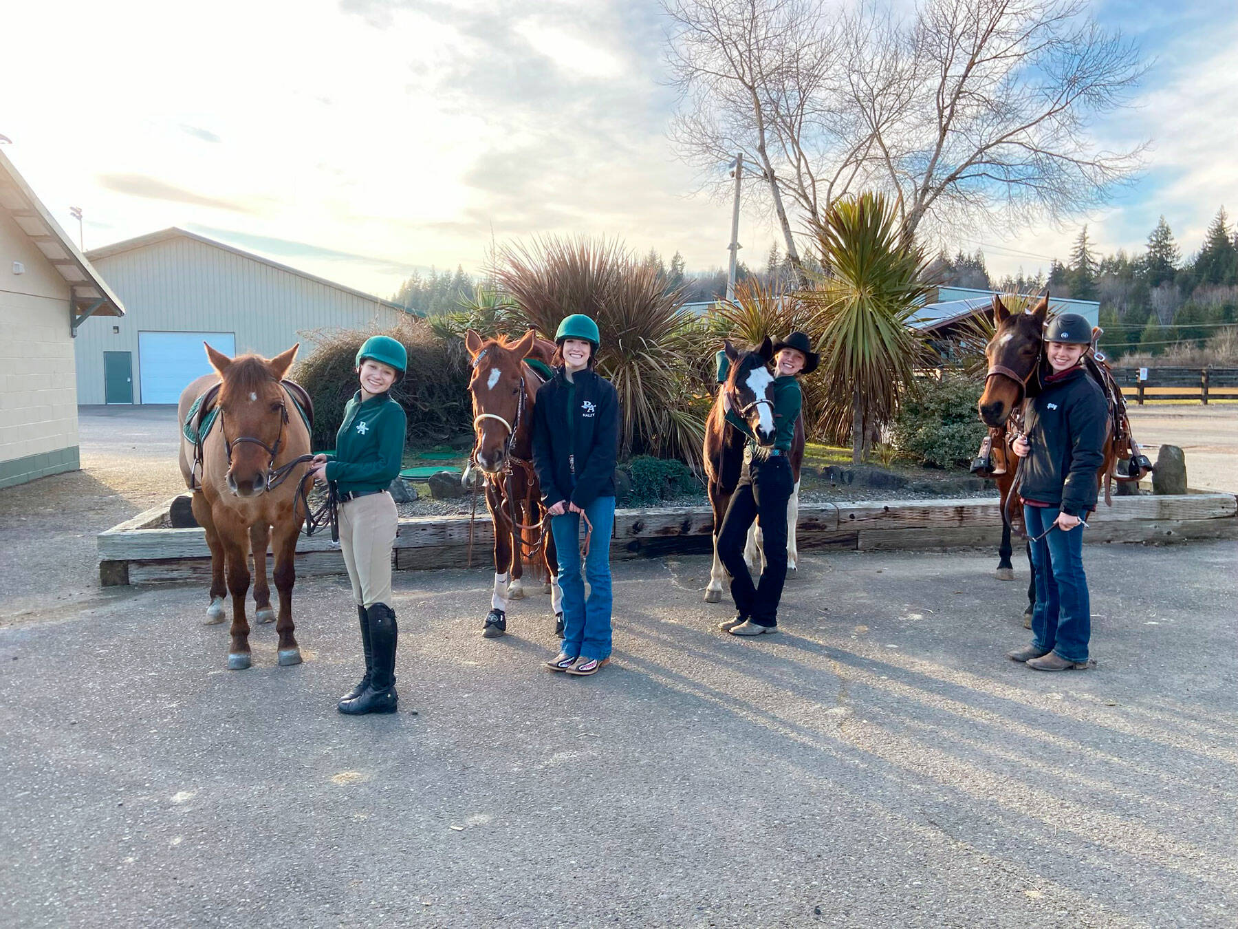 WAHSET competitors from the Sequim and Port Angeles teams get ready to compete in Versatility at the second district meet of the season held at Gray’s Harbor Fairgrounds are, from left, Sydney Hutton, Haley Bishop, Maggie Anderson and Libby Swanberg. (Photo by Katie Newton)