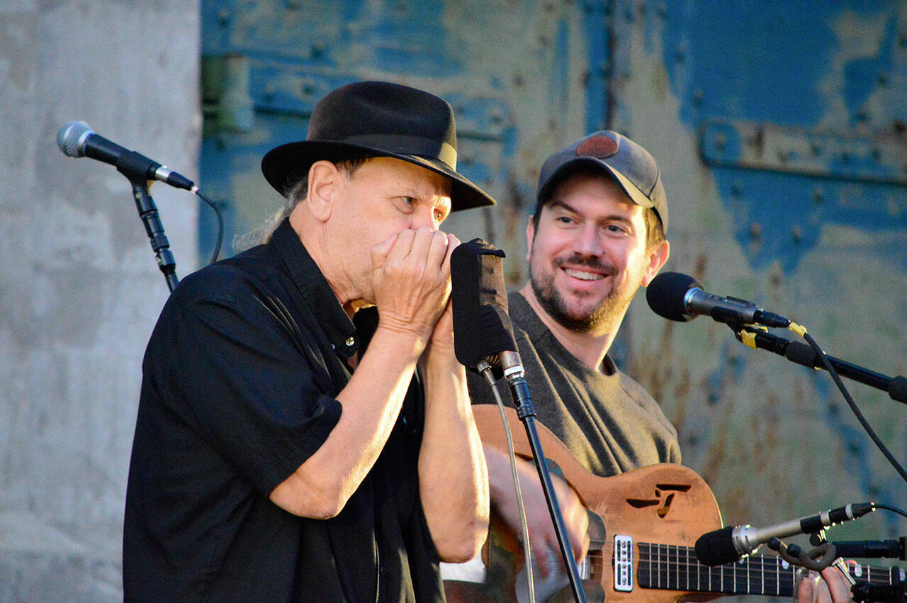 Bluesman David Jacobs-Strain, right, and harmonica player Bob Beach — along with dozens of other performers and bands — will return to the Juan de Fuca Festival in Port Angeles this May. (Diane Urbani de la Paz/Peninsula Daily News)