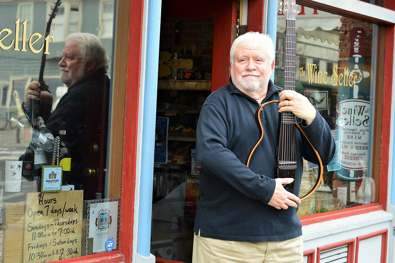 Guitarist Joe Euro, aka the Wine Seller of downtown Port Townsend, will give this Thursday’s Candlelight Concert in person at Trinity United Methodist Church. Proceeds will benefit Bayside Housing & Services. (Diane Urbani de la Paz/Peninsula Daily News)