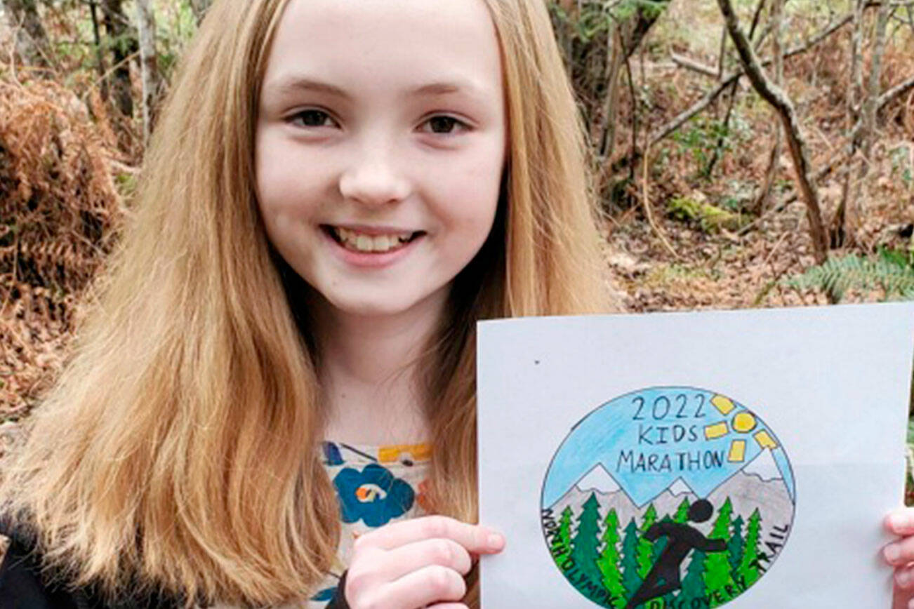 Sarah Butterworth with her winning design for the 2022 Kids Marathon medal.