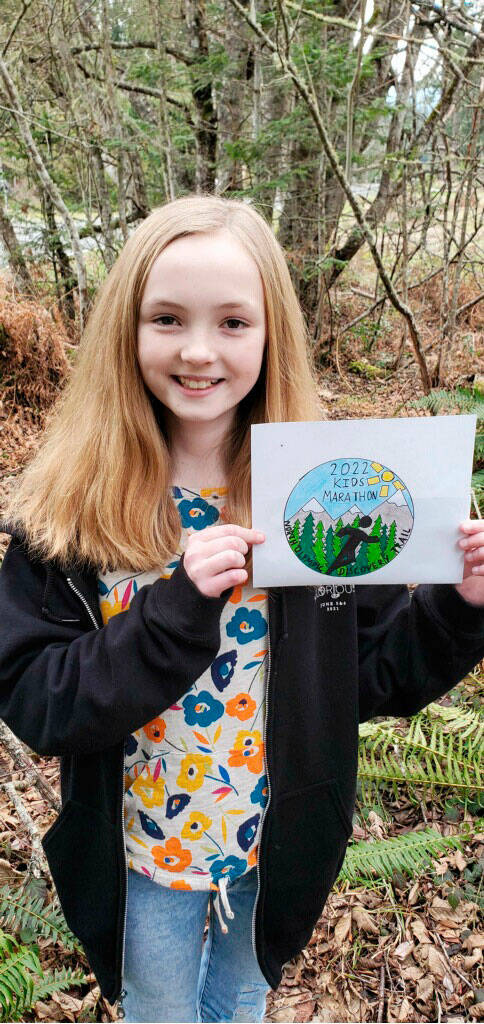 Sarah Butterworth with her winning design for the 2022 Kids Marathon medal.