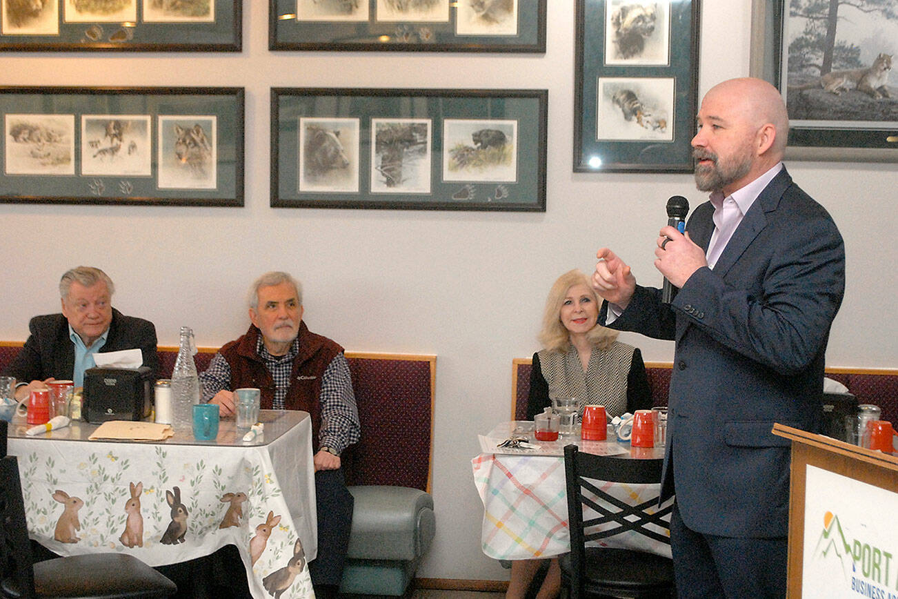 Keith Thorpe/Peninsula Daily News
Terry Ward, vice-president of Sound Publishing and publisher of the six-day-per-week Peninsula Daily News and the weekly Sequim Gazette and Forks Forum, right, speaks about changes to the newspapers during a Tuesday morning breakfast with members of the Port Angeles Business Association. Ward described the switch to delivery-by-mail, adjustments to the publication schedule and the general health of the newspaper group. Among those in attendence were business association members, from left, Dick Pilling, former PDN publisher John Brewer and former mayor Cherie Kidd.