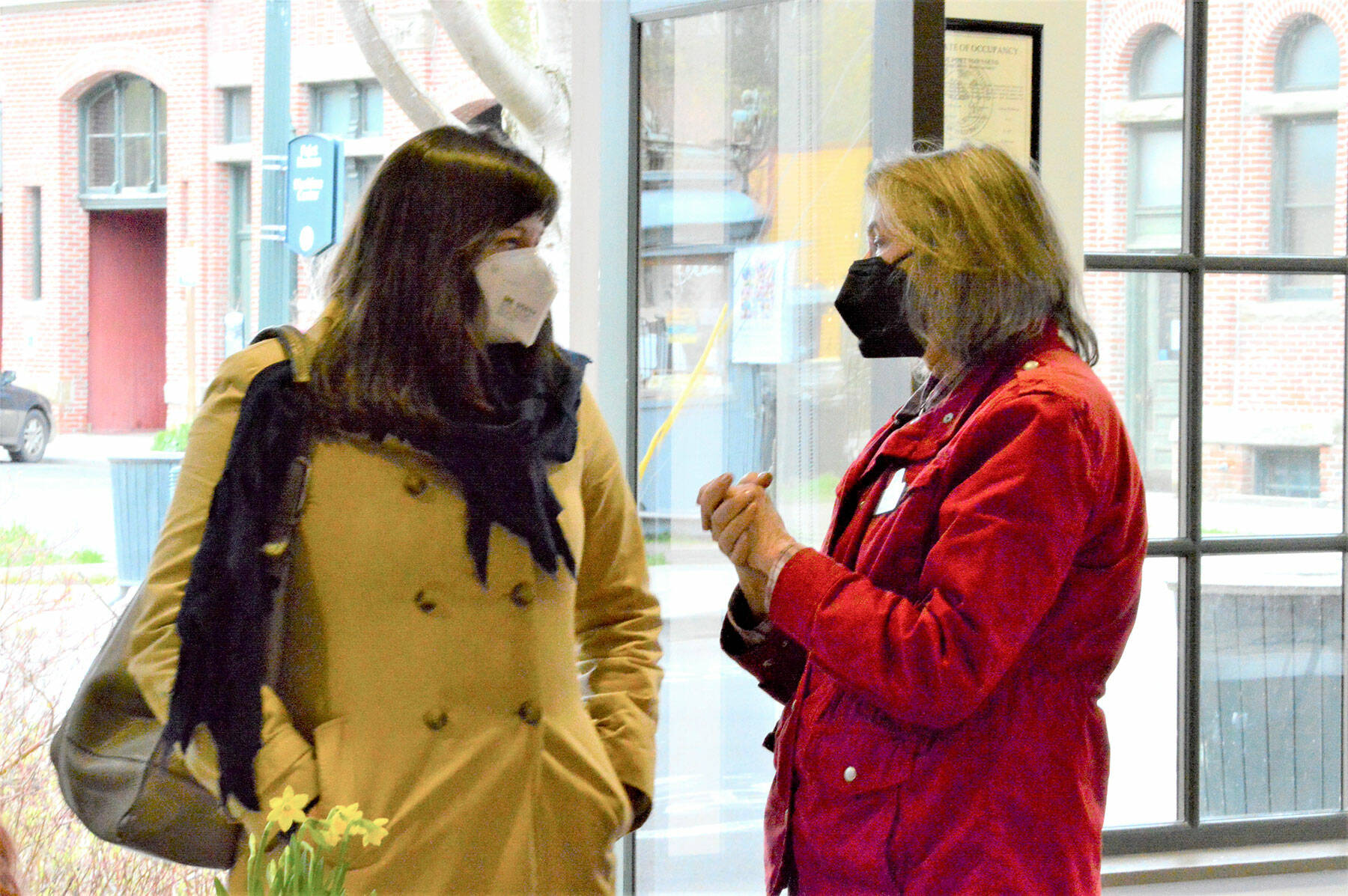 Port Townsend School District Superintendent Linda Rosenbury, left, and Main Street Program Executive Director Mari Mullen were among the people who came to the city’s streateries-and-parklets open house at the Cotton Building on Tuesday. (Diane Urbani de la Paz/Peninsula Daily News)