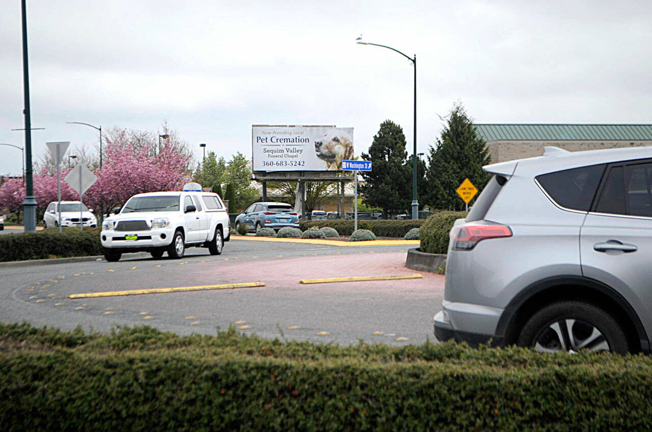 Construction crews will place a new overlay on West Washington Street in Sequim starting in late April from the River Road roundabout to the Ninth Avenue roundabout over about four weeks. (Matthew Nash/Olympic Peninsula News Group)