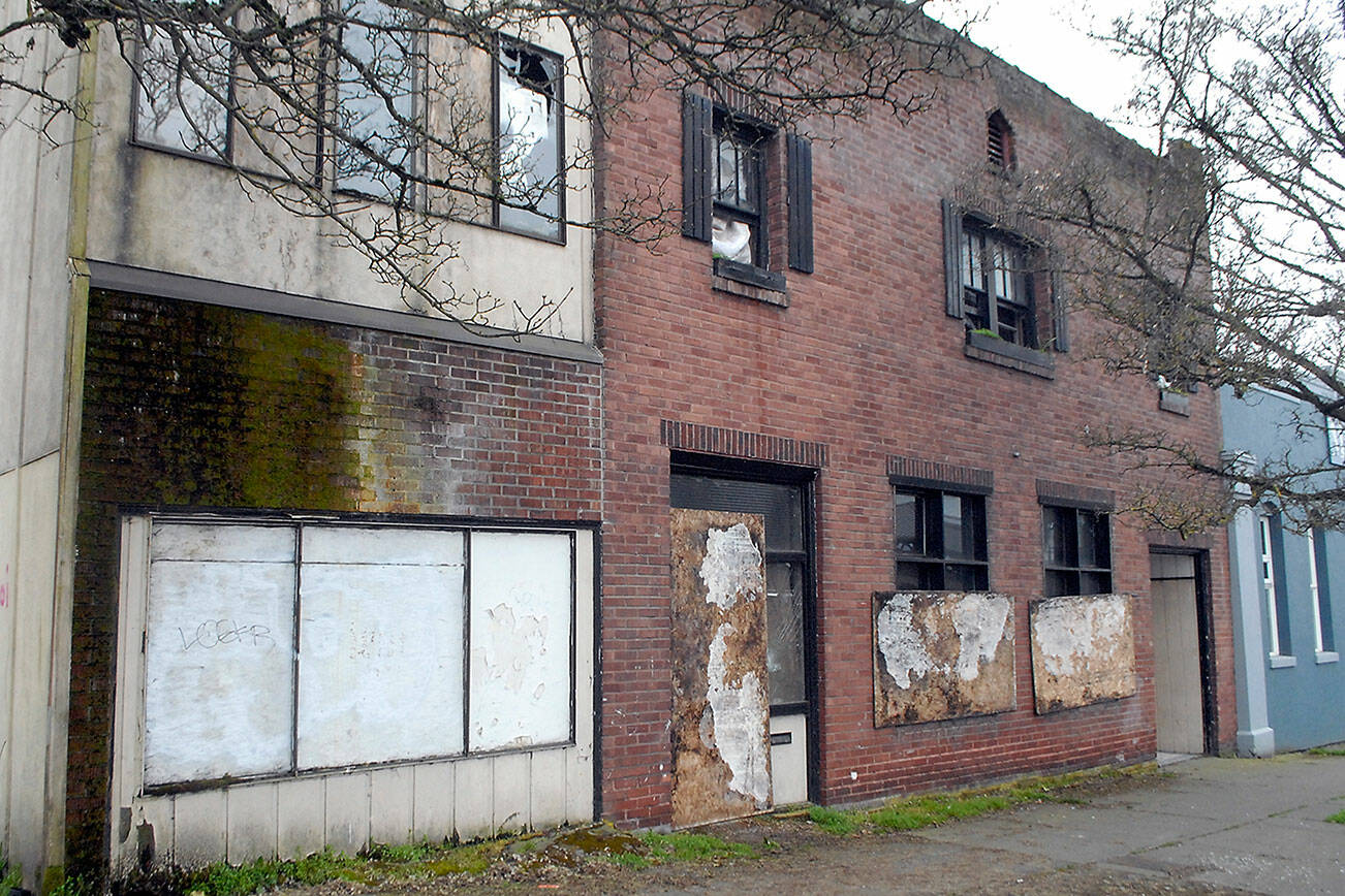 Keith Thorpe/Peninsula Daily News
An abandoned building at 204 E. Front Street in downtown Port Angeles sits boarded up on Friday.