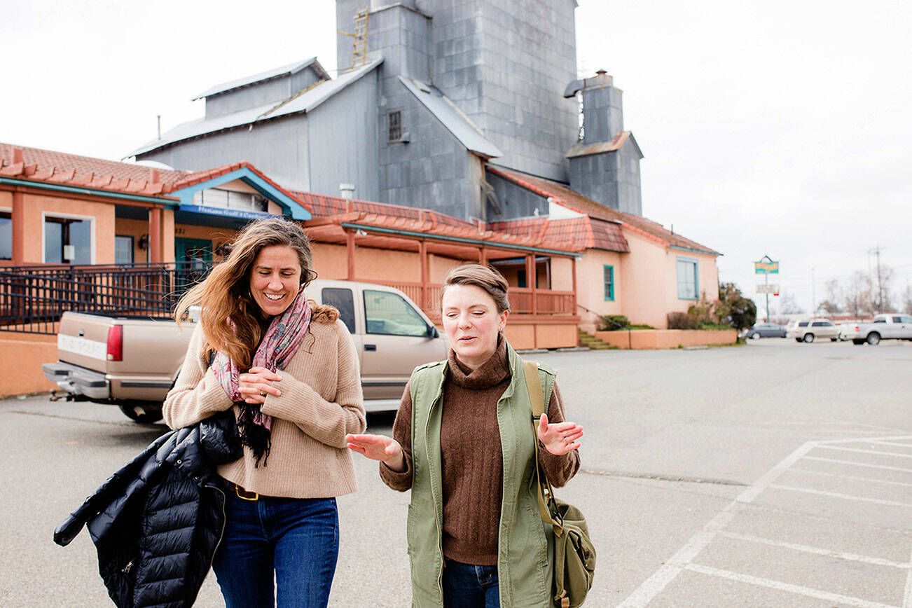 Olympic Angels founder Morgan Hanna of Port Townsend, left, and Love Box volunteer Quinn Mitchell take a walk in Sequim, Mitchell’s home town, to talk about Olympic Angels’ expansion into Clallam County. (April Thompson/Olympic Angels)