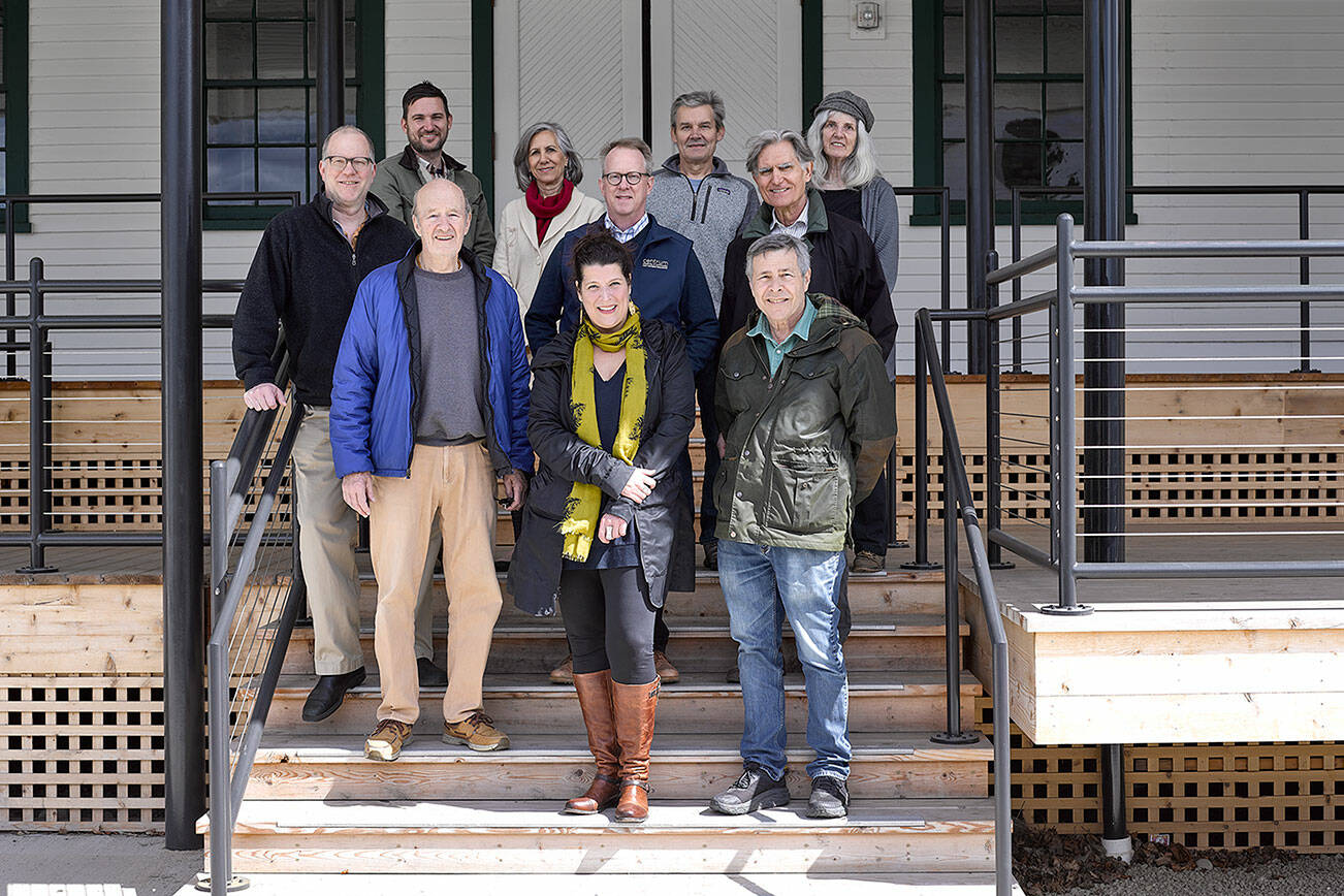 The new Creative Alliance at Fort Worden State Park includes, clockwise from left, Copper Canyon Press’ Joseph Bednarik; Heron Scott of the Port Townsend School of Woodworking; Renee Klein of Madrona MindBody Institute; Centrum’s Rob Birman; KPTZ’s Robert Ambrose, Copper Canyon’s George Knotek; KPTZ’s Kate Ingram; Corvidae Press’ Randy Arnest; Northwind Art’s Teresa Verraes and Fort Worden Public Development Authority Executive Director David Timmons. (Brian Goodman)