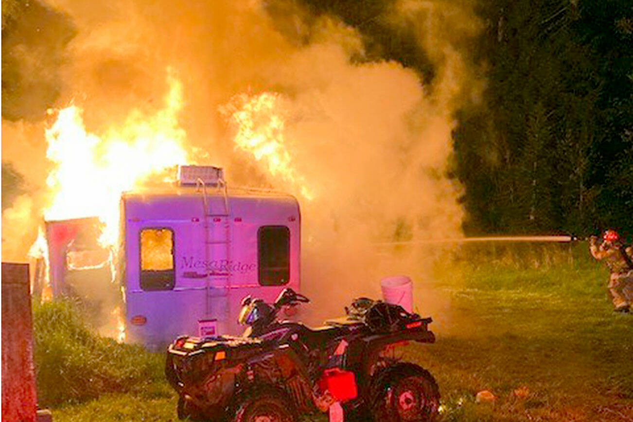 East Jefferson Fire Rescue firefighters battle a trsiler fire in Chiamcum.