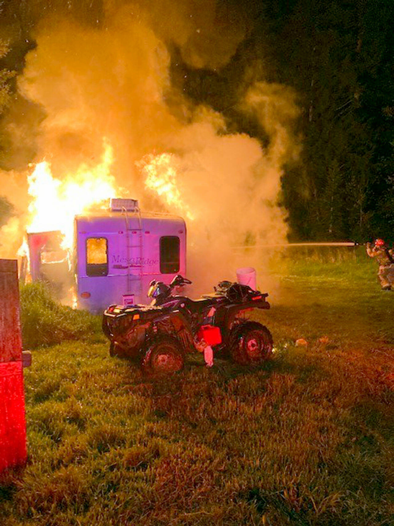 East Jefferson Fire Rescue firefighters battle a trailer fire in Chiamcum.
