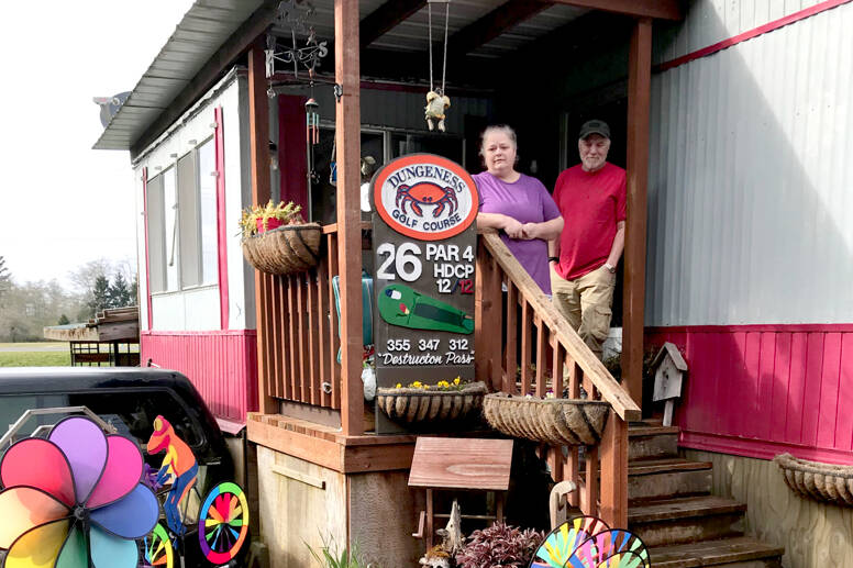 Dee, left, and Jerry Janssen moved to the Rain Forest Mobile Home Park in Forks three years ago after they were priced out of their rented mobile home in Sequim. The couple is now faced with trying to find another place to live where they can bring their two Labrador retrievers. (Paula Hunt/for Peninsula Daily News)