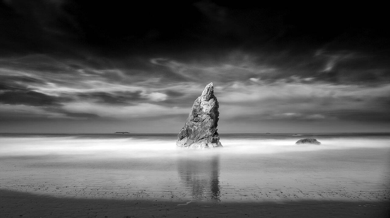 Ruby Beach and Destruction island is among the images by Steve Deligan on display at the Bay Club in Port Ludlow.