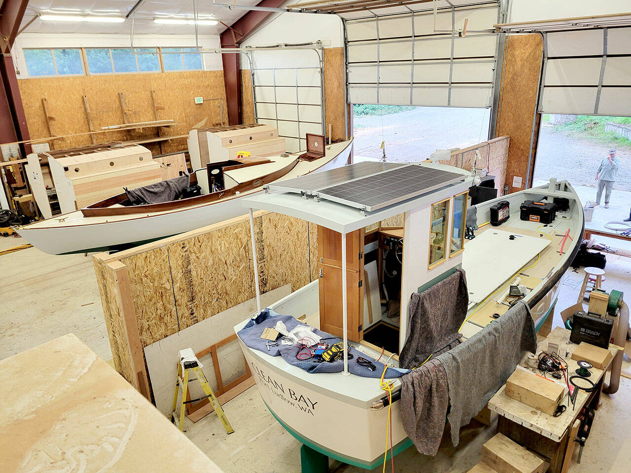 Clean Bay, an all-electric workboat with solar power, will be christened after a ribbon-cutting on Saturday.