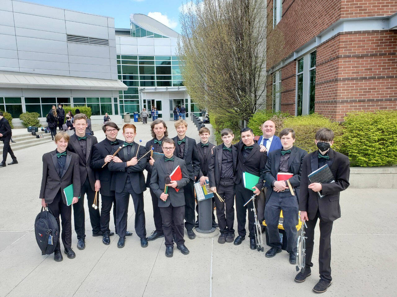 Pictured, from left to right, Jacob Weaver, Will Rife, Jack Council, Everett Hunsaker, Jack Slaczka, Gavin Bringhurst, Reid Schmidt, Cyrus Deede, Bobby Starr, Isaac Ordona, band director Jarrett Hansen, Caleb Stuber and Liam Hare.