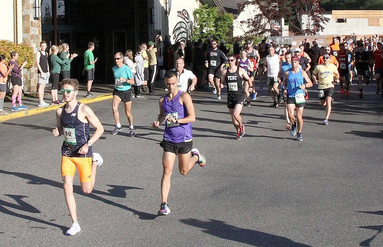 Dave Logan/for Peninsula Daily News
Runners take off at the start of the North Olympic Discovery Marathon in June 2019, the last time the public was allowed to attend the marathon.