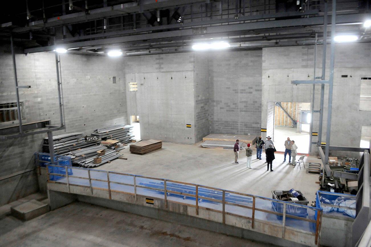 Keith Thorpe/Peninsula Daily News
Visitors gather on the stage of the auditorium during Thursday's open house at the Field Arts & Events Hall.