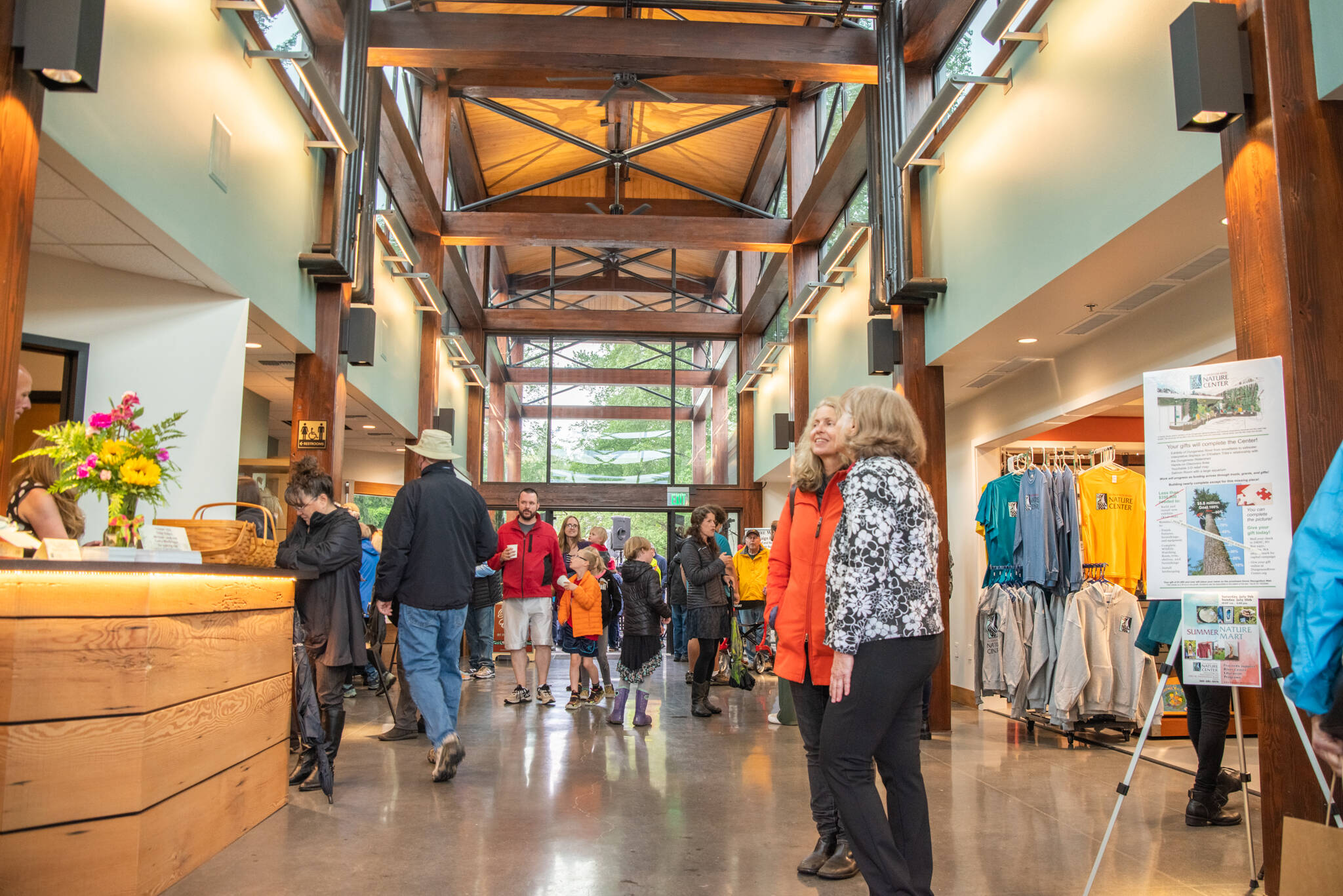 Emily Matthiessen / 
Olympic Peninsula News Group
Community members and dignitaries explore the newly refurbished and expanded Dungeness River Nature Center Sunday afternoon.
Community members and dignitaries explore the newly refurbished and expanded Dungeness River Nature Center. (Emily Matthiessen/Olympic Peninsula News Group)