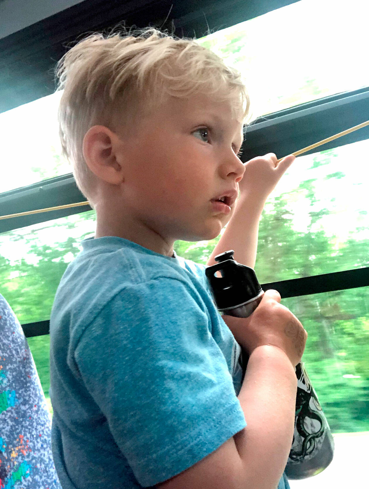 Makee Lahti Locklear, 3, rides a Jefferson Transit bus during Car Free Day. He rode with his mother to a gymnastics class.