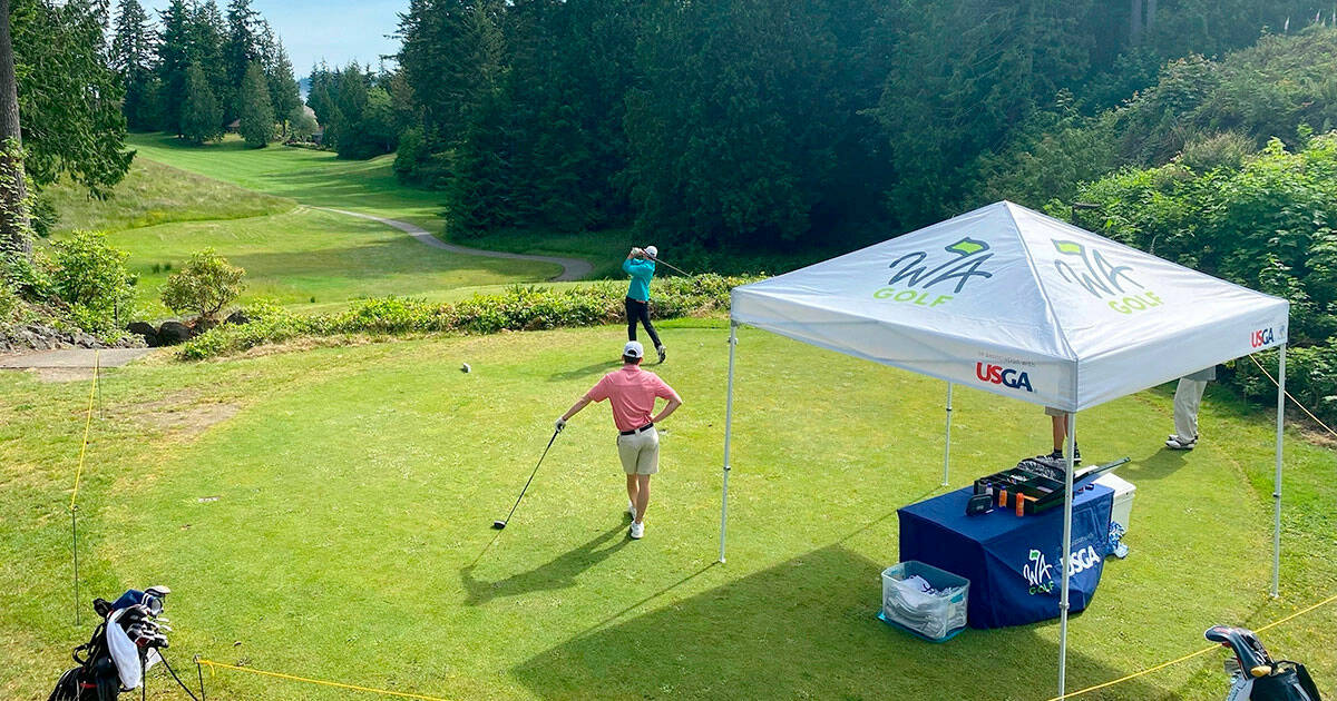 Courtesy WA Golf Golfers competing in a U.S. Junior Amateur Qualifier tee off on the first hole at Port Ludlow Golf Course on Tuesday.