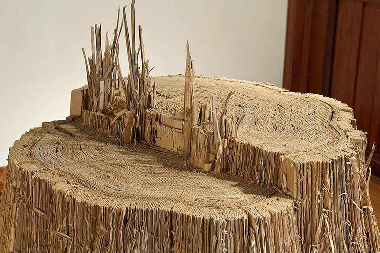 Tree stumps made of cardboard and other creations by Karne Rudd are on view at the Jefferson Museum of Art & History.