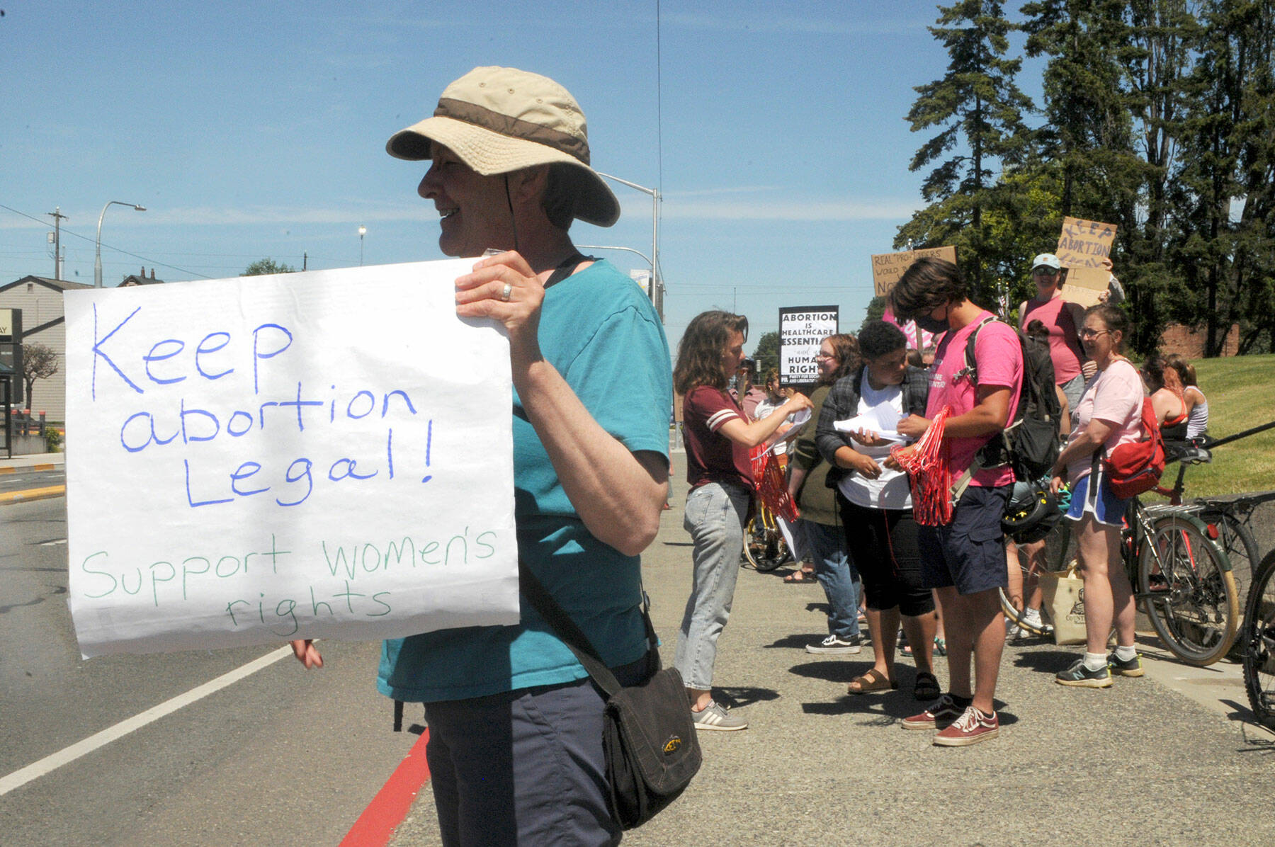 Carole Scholl of Port Angeles shows her support for women’s rights during a rally Saturday following the U.S. Supreme Court’s decision to overturn Roe v. Wade. For more on the rallies in Port Angeles, Sequim and Port Townsend, see Monday’s print and online editions. (Keith Thorpe/Peninsula Daily News)