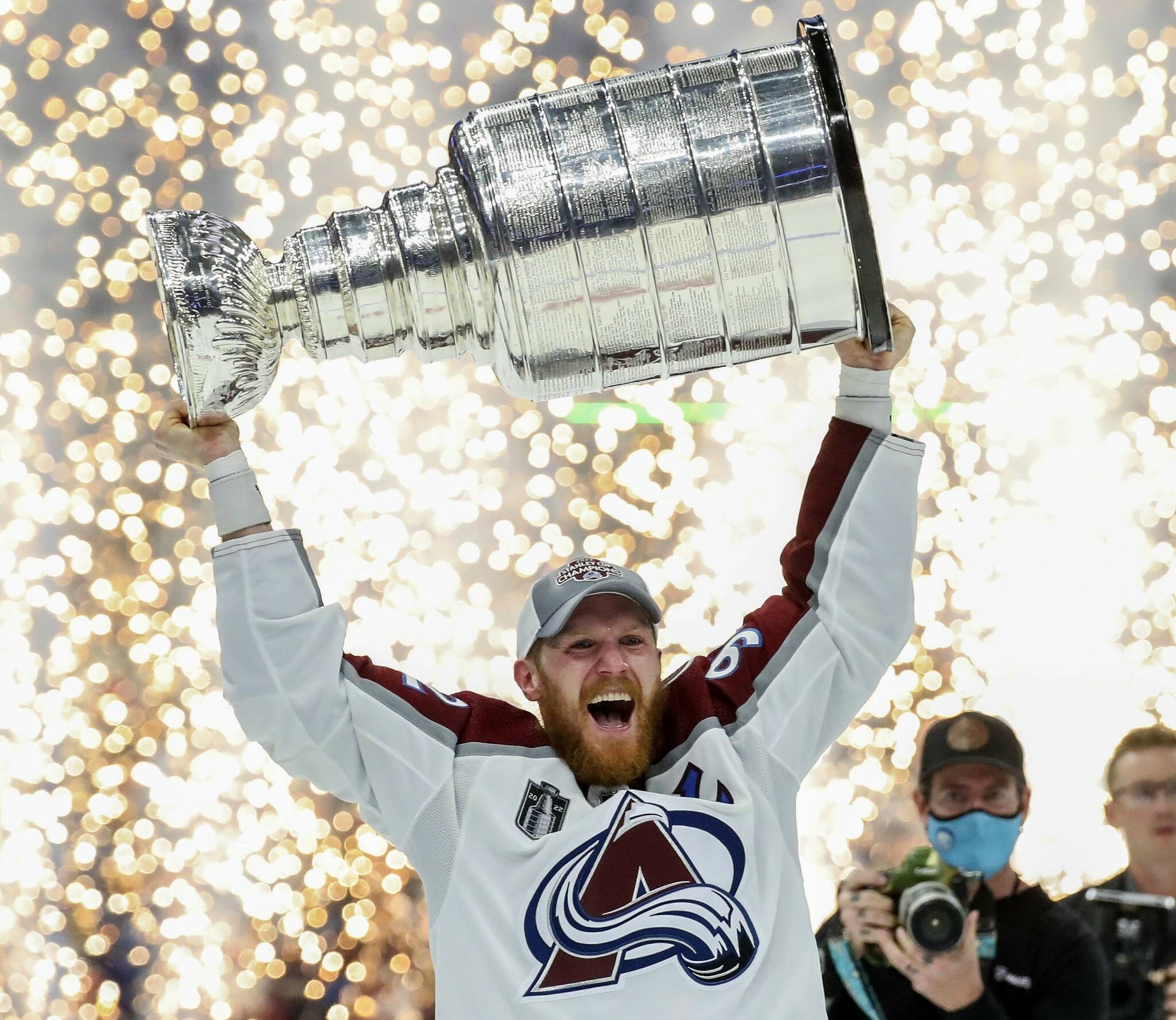 Colorado Avalanche left wing Gabriel Landeskog (92) holds the Stanley Cup after the Avalanche defeated the Tampa Bay Lightning 2-1 in Game 6 of the NHL hockey Stanley Cup Finals on Sunday in Tampa, Fla. (Dirk Shadd/Tampa Bay Times via AP)