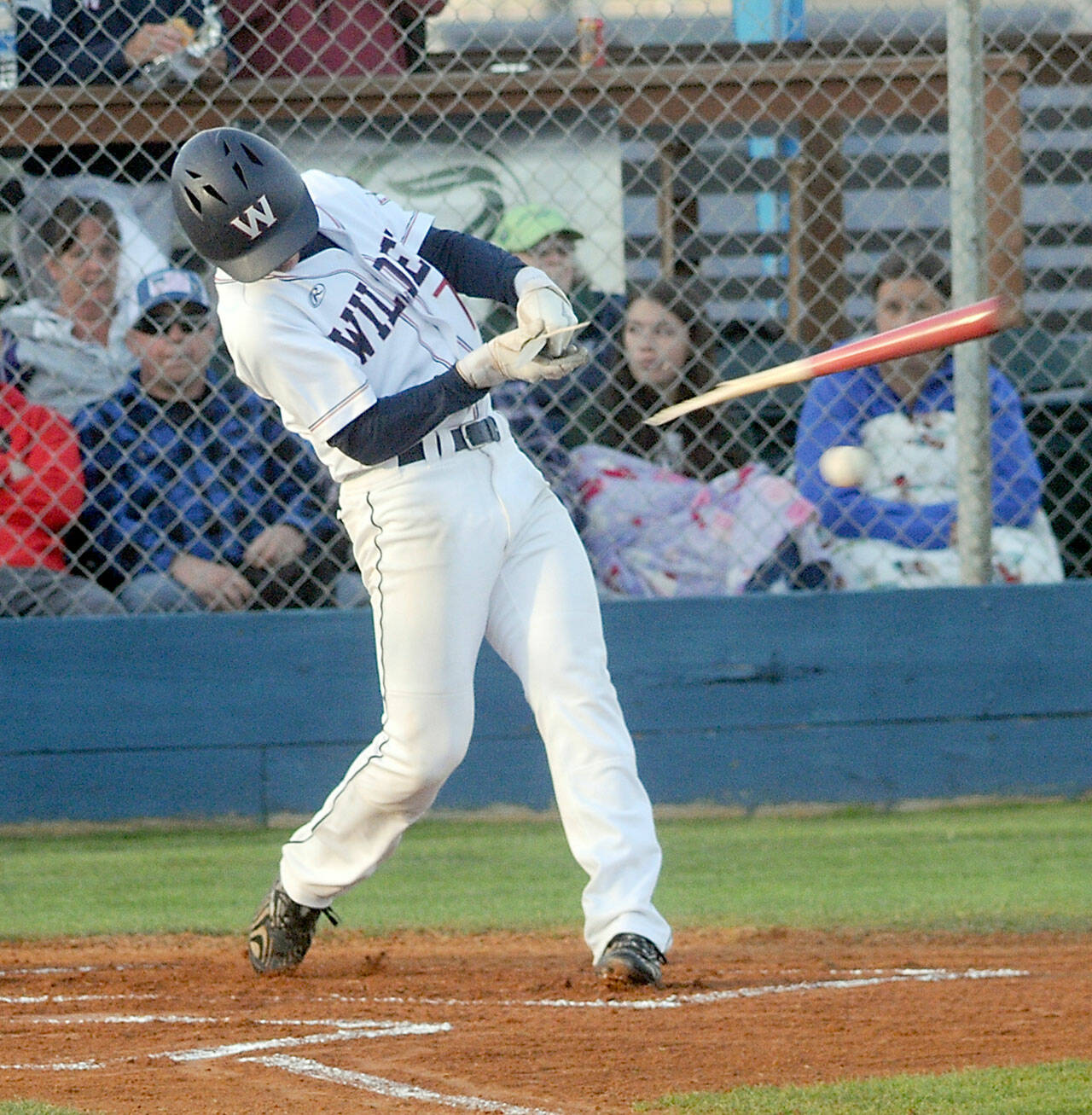 Wilder Senior’s Ezra Townsend swings and breaks his bat on contact during the first inning of Saturday’s game against NW Sting at Port Angeles Civic Field. (Keith Thorpe/Peninsula Daily News)