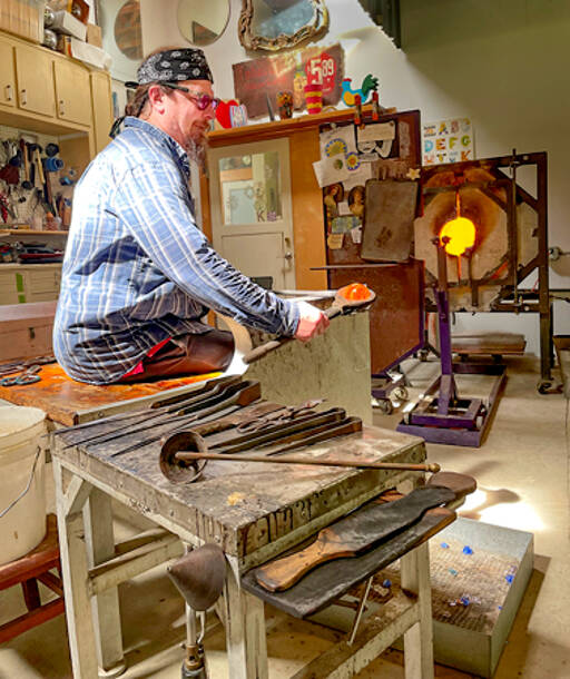 Brian Iverson works on a blown glass creation. (Port Townsend Gallery)