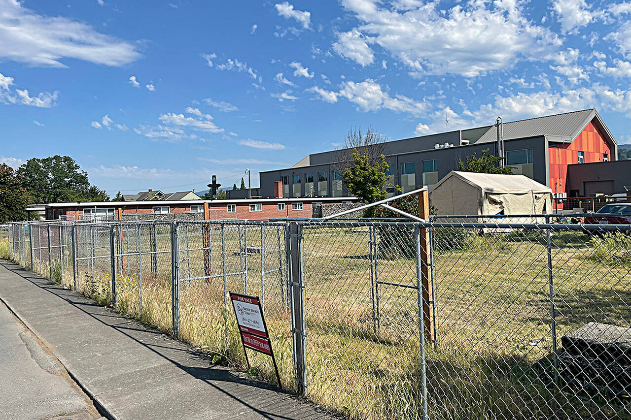 Three lots on West Spruce Street are planned to become parking for the City of Sequim. (Matthew Nash/Olympic Peninsula News Group)