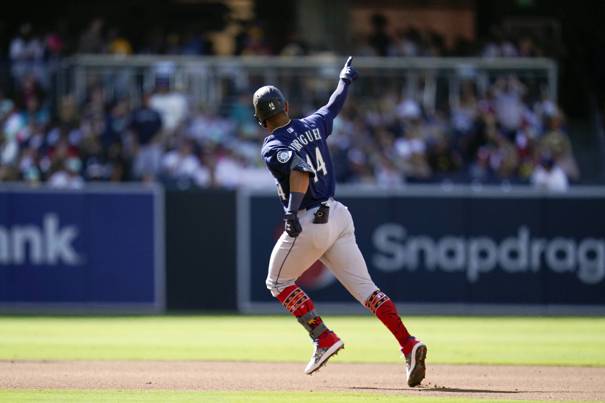 The Seattle Mariners’ Julio Rodriguez reacts after hitting a two-run home run during the fourth inning of a baseball game against the San Diego Padres on Monday in San Diego. (Gregory Bull/The Associated Press)