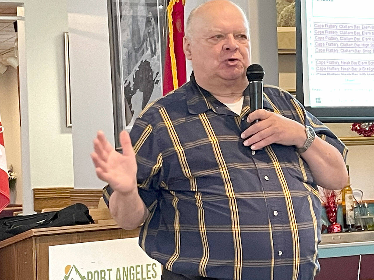 Jim Buck, the 24th Legislative District representative from 1995-2007, lays out what he called the deadly risk that old and seismically unsafe school buildings in Washington pose for children in grades K-12. A state Department of Natural Resources report released last year determined that 93 percent of the schools in a study pose extreme danger for death and entrapment to school children. (Paula Hunt/Peninsula Daily News)