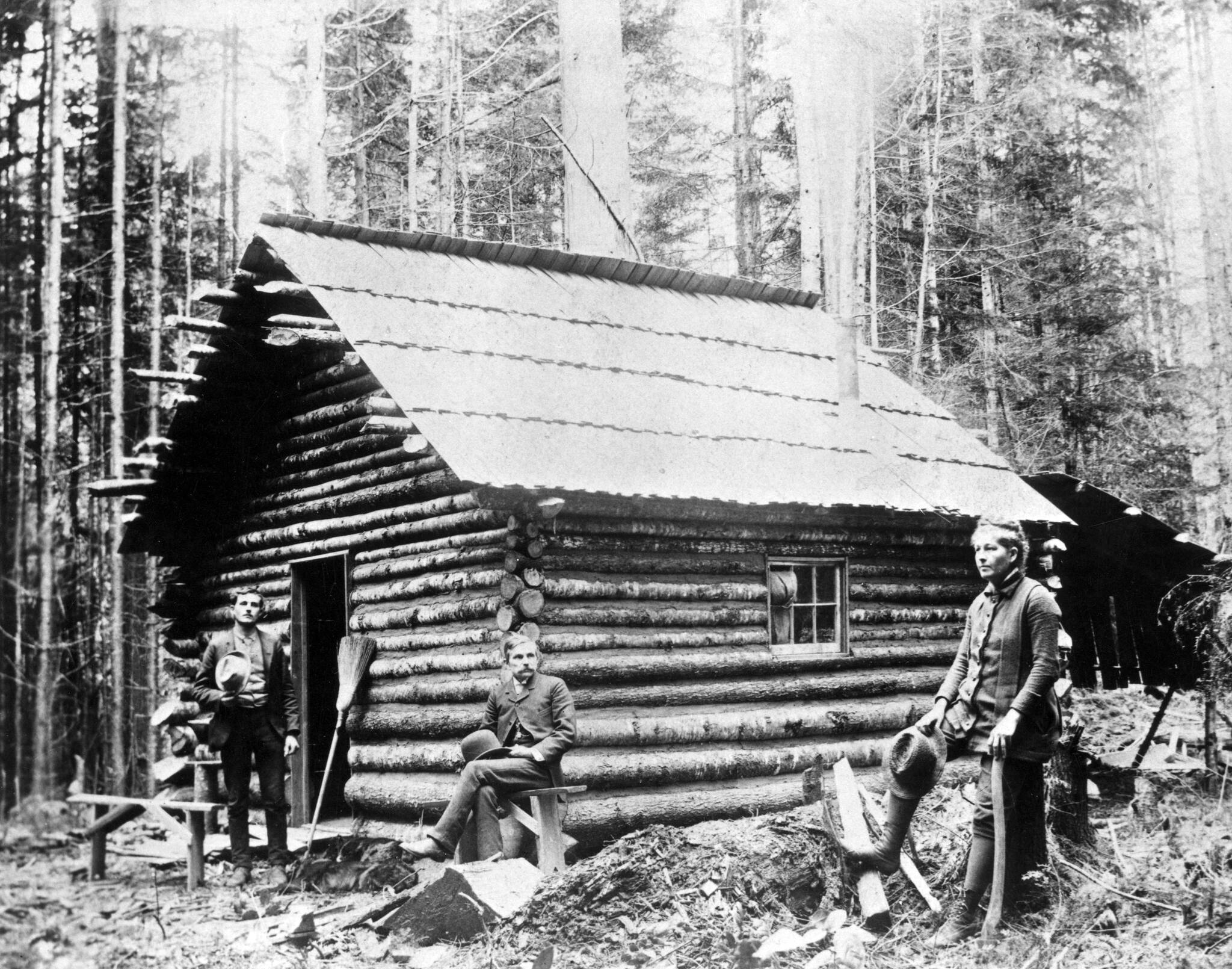 Lt to Rt:   Unidentified man, George Venerable Smith-seated, Ione Tomlinson 
North Olympic History Center