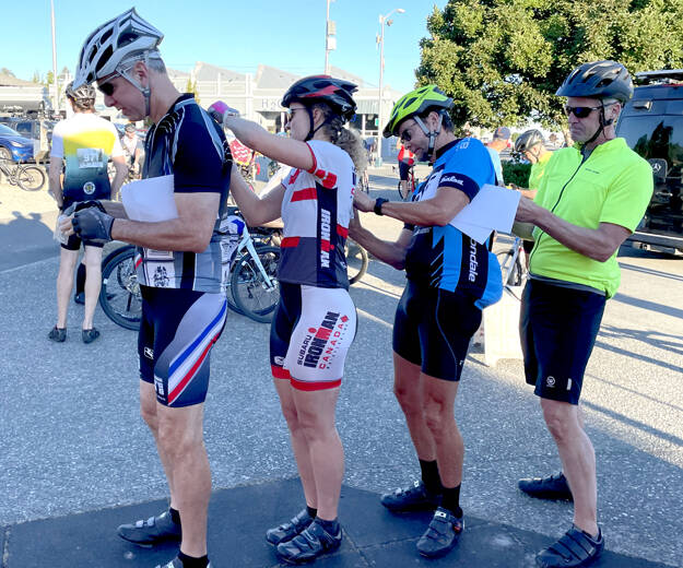 Cyclists are required to wear a helmet and keep their number bib visible at all times during Ride the Hurricane. Only registered riders can participate in the popular annual event — one of the rare times the road to Hurricane Ridge in the Olympic National Park is closed to traffic. (Paula Hunt/Peninsula Daily News)