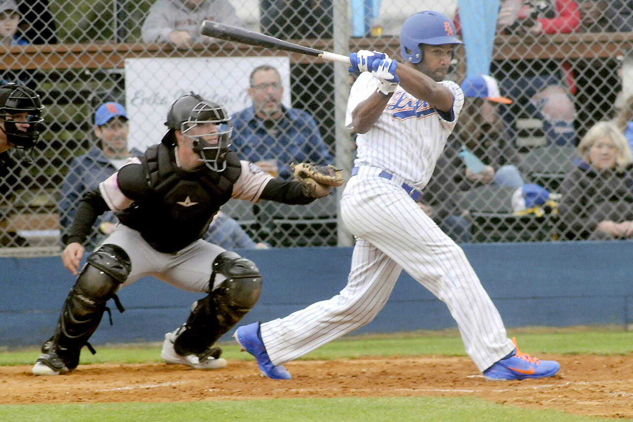Keith Thorpe/Peninsula Daily News
Lefties' Golden Tate hits into an RBI double as Bend catcher Isah Burk looks on during a game in June at Port Angeles Civic Field.