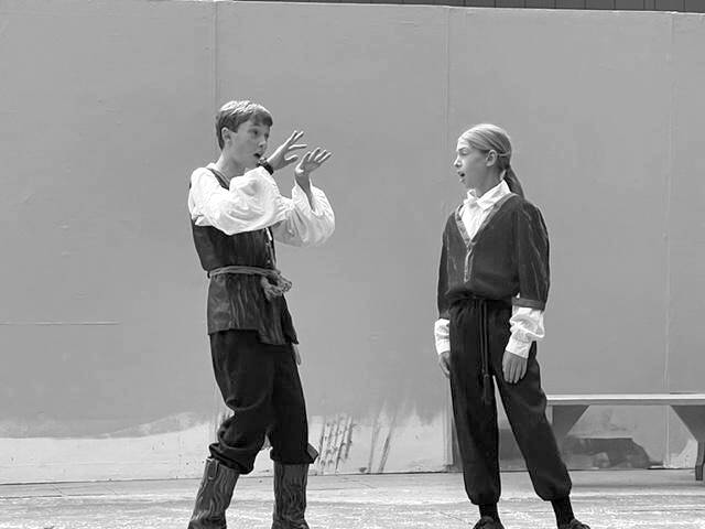 Henry Wendel as the sheriff tells his assistant, played by Mchenry Miller, his plan to capture Robin.