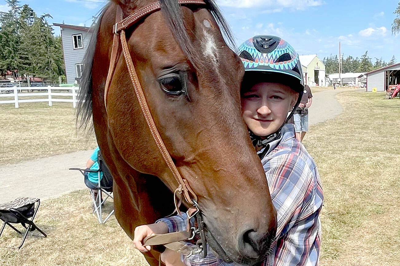 Layla Franson, 15, and Jackson, her 10-year-old Quarter Horse, are competing in 4H at the Jefferson County Fair this weekend. Like many counties across the state, Jefferson County has seen a decline in the numbers of youths enrolled in 4H after the COVID lockdown and is actively seeking to reboot its program. (Paula Hunt/Peninsula Daily News)