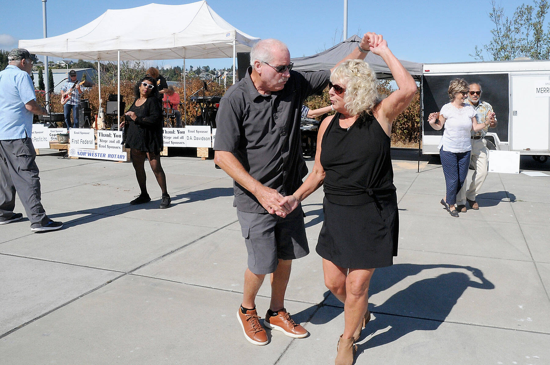 John and Freia Palmer of Port Angeles dance to the music of Sound Advice during Saturday’s Jammin’ in the Park at Pebble Beach Park on the Port Angeles waterfront. The event, hosted by the Nor’Wester Rotary Club, featured a day of music, food and a beer garden, as well as numerous informational displays. (Keith Thorpe/Peninsula Daily News)