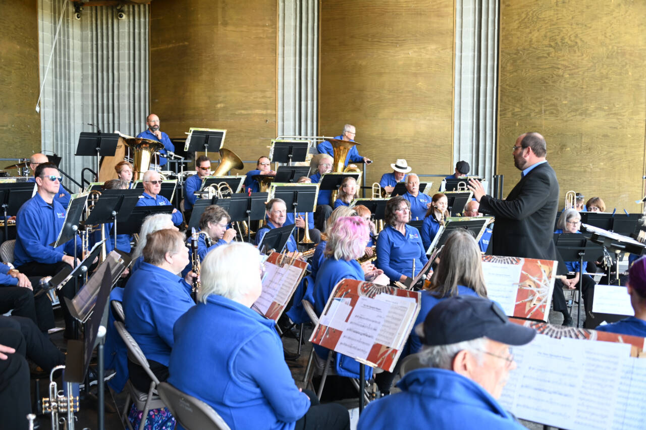 Photo courtesy of Richard Greenway, Sequim City Band/Sequim City Band
Tyler Benedict directs Sequim City Band members at the group’s Aug. 14 concert. The band is back at the James Center today.