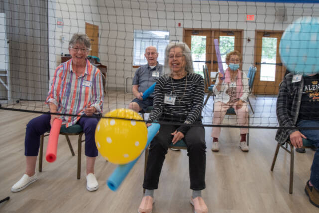 Emily Matthiessen/Olympic Peninsula News Group 

Elaine Bradford and Cecelia Schouten participate in a variation of balloon volleyball in which participants keep three balloons going by hitting them with pool noodles. Schouten, according to her daughter Valerie Schouten, was always very athletic and loved climbing trees as a child. She was recruited to join the All-American Girls Professional Baseball League, but her father said, “no.”
