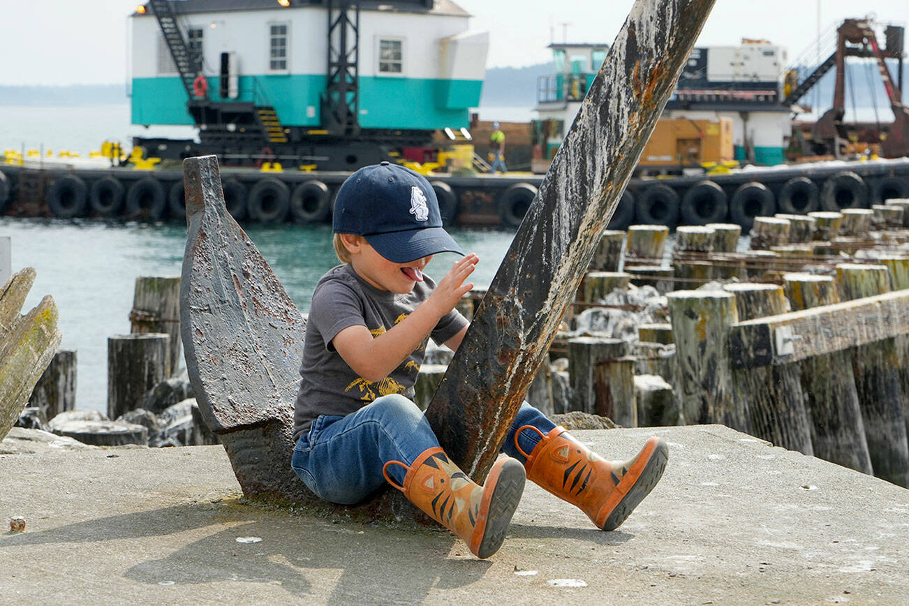 Steve Mullensky/for Peninsula Daily News

Max Albert Ruffo, 4 1/2 from Port Townsend, rides the anchor fluke like a bucking bronco while visiting Point Hudson with his grandma on Tuesday.